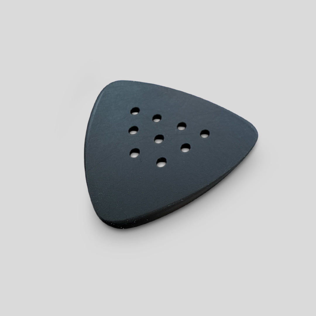 Triangular sanding pad with holes on a gray background